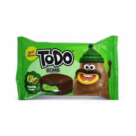 صورة تودو كب كيك شوكولاتة محشو بكريمة الفستق ومغطي بالشوكولاتة